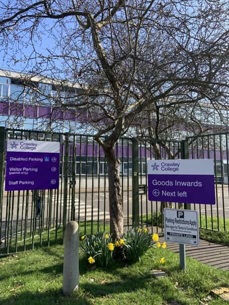 An image of outdoor signage for Crawley College.